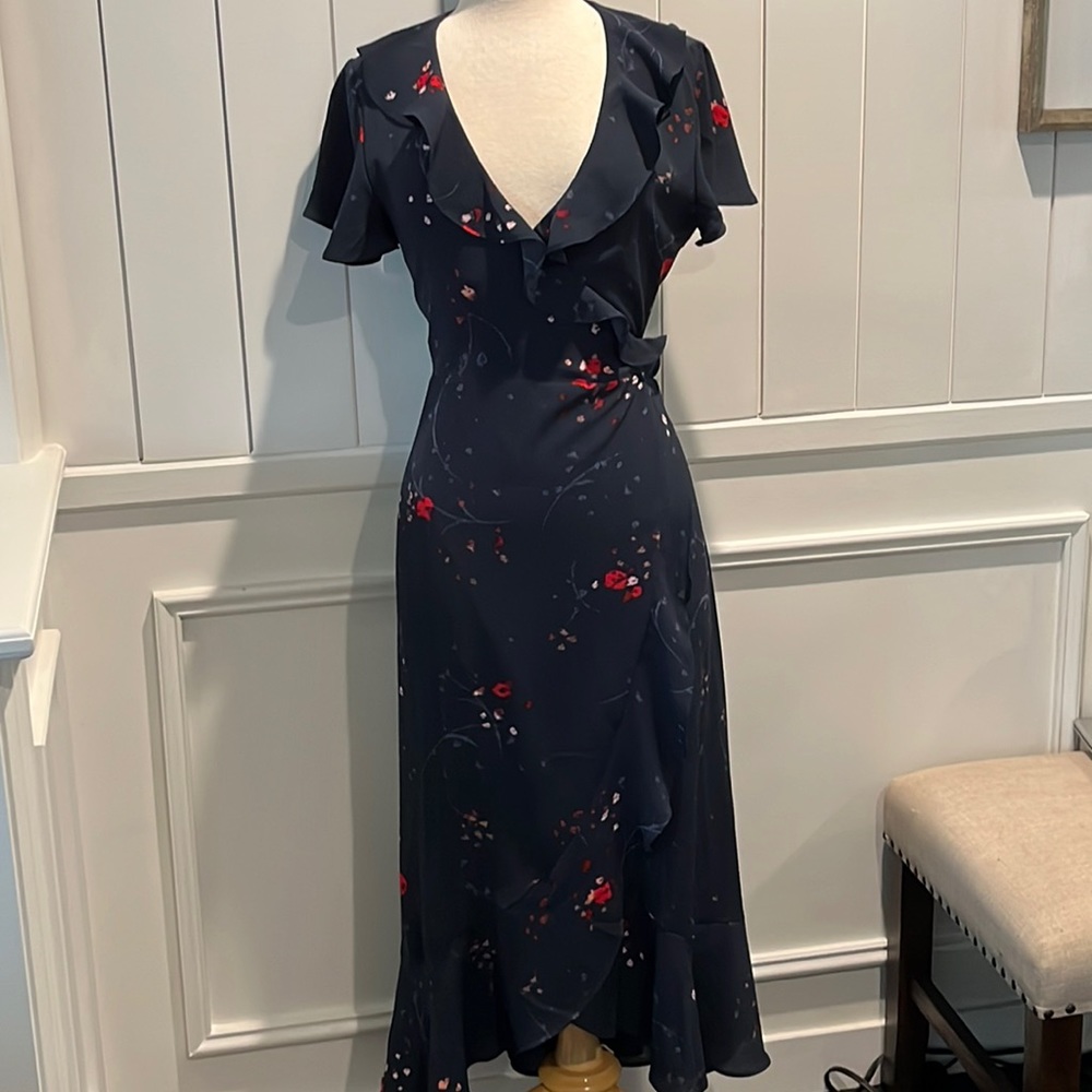 Like new, extremely easy to dress up or down! Soft fabric and wears well….
